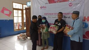 Penyerahan Bantuan Untuk Yatim dan Kaum Dhuafa